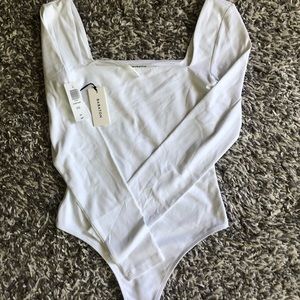 NWT- Babaton contour bodysuit (small)